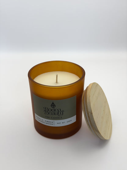 The Candle - Vanilla · Amber · Sandalwood
